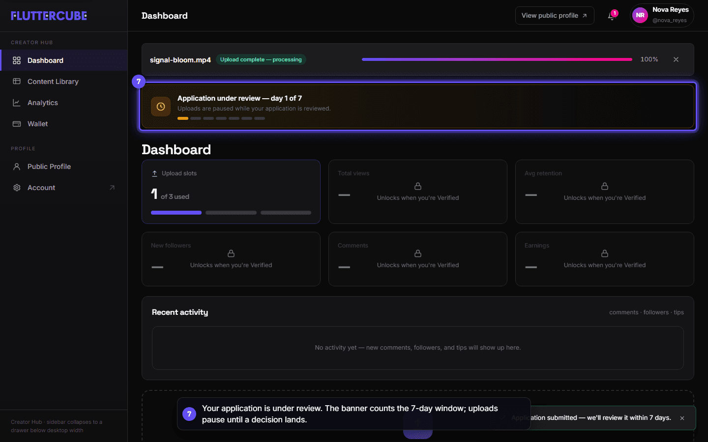 The Dashboard banner counting the seven-day review window with uploads paused.